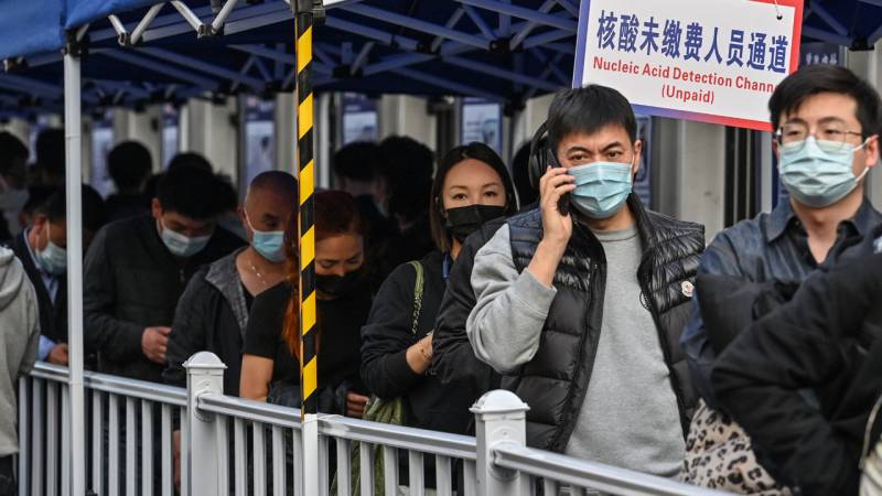 Chinese city locks down, Shanghai shuts schools as Covid spikes