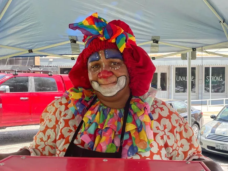 In Uvalde, A Woman In Clown Colors Makes Kids Smile