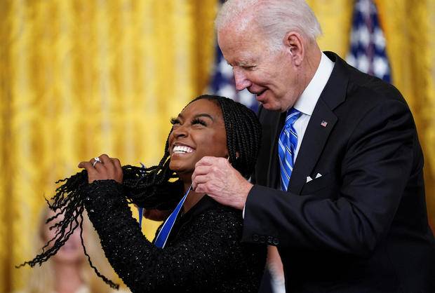 Biden presents Presidential Medal of Freedom to Simone Biles, Gabrielle Giffords and 14 others