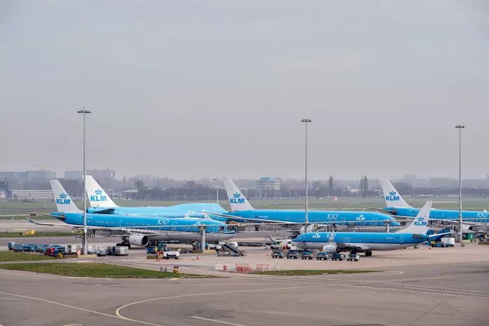 Mass confusion at Amsterdam Airport after KLM says it won’t accept checked luggage