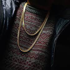 The significance of gold necklaces in black culture? Why do rappers wear them a lot?