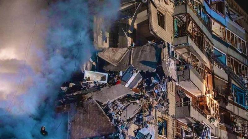 Terrified woman seen amid rubble on 7th floor of building hit by Russian missile