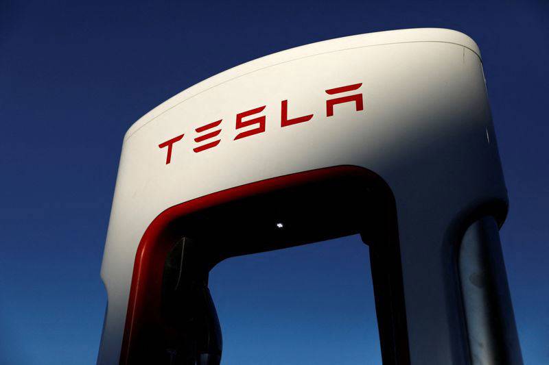 Tesla may cut prices again in 'turbulent times' 