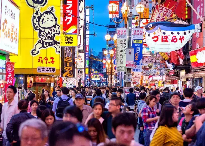 Japan's population falls while foreign residents rise to record