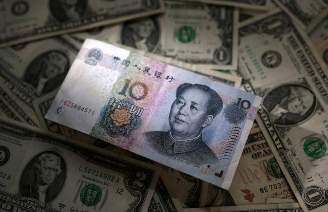 Dollar flat after retail sales data, yuan falls to 9-month low