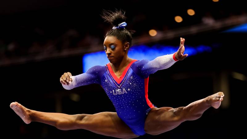 Simone Biles surged to the top on Day 1 